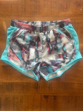 Under Armour Women’s Multicolor Runners Athletic Shorts with Teal Trim